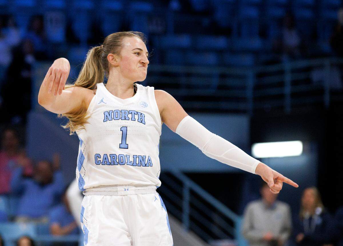 North Carolina’s Alyssa Ustby reacts after knocking down a three-pointer during the first half of the Tar Heels’ game against Kentucky on Thursday, Dec. 5, 2024, at Carmichael Arena in Chapel Hill, N.C.