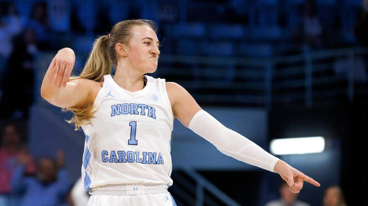 North Carolina’s Alyssa Ustby reacts after knocking down a three-pointer during the first half of the Tar Heels’ game against Kentucky on Thursday, Dec. 5, 2024, at Carmichael Arena in Chapel Hill, N.C.
