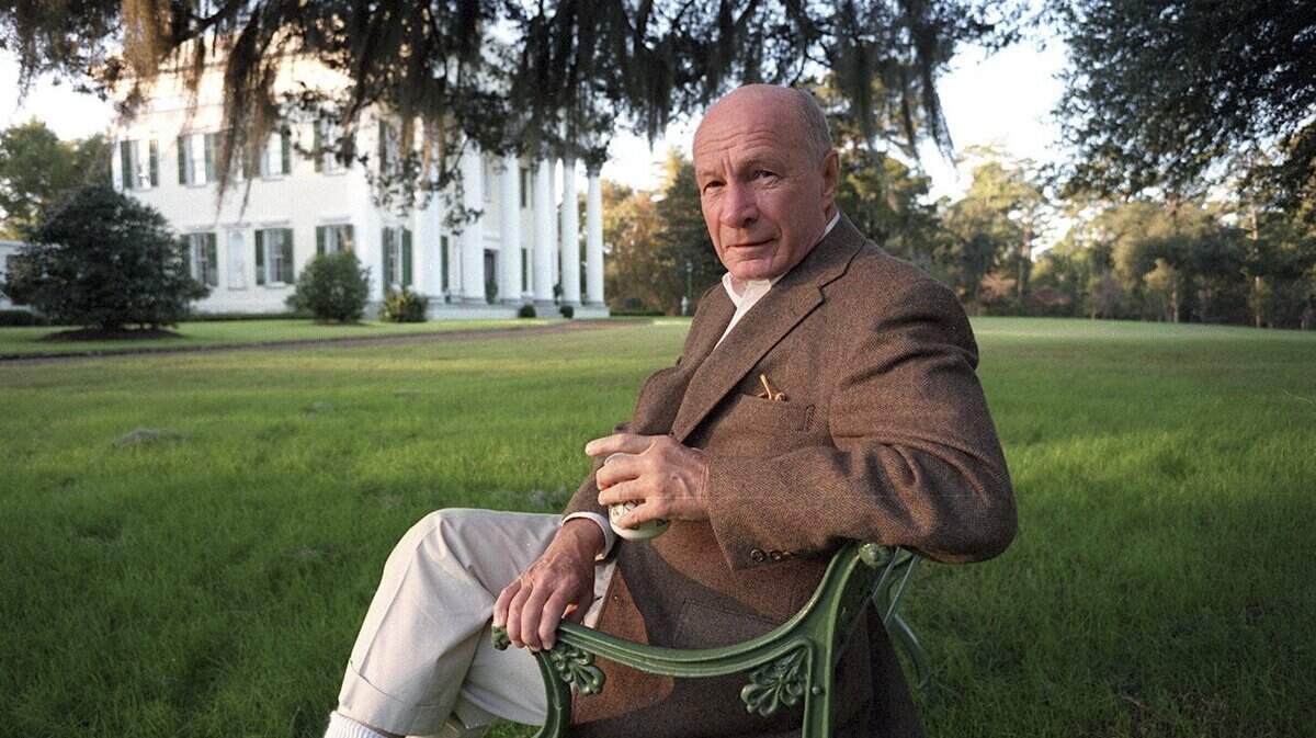 Richard Jenrette at one of a dozen historic American homes he restored and furnished with period antiques, in Charleston, S.C., in November 1996.
