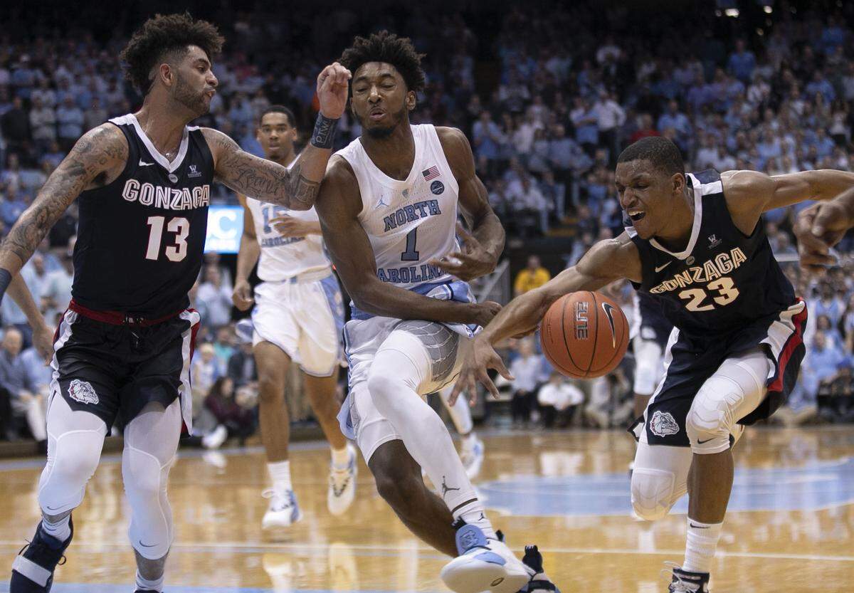 Gonzaga’s Zach Norvell Jr. (23) forces a turnover by North Carolina’s Leaky Black (1) during the first half against North Carolina on Saturday, December 15, 2018 at the Smith Center in Chapel Hill, N.C.