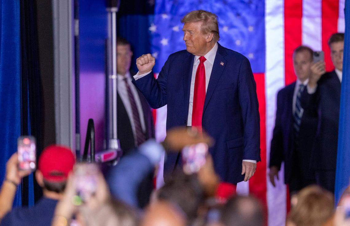 Former President Donald Trump takes the stage during a rally at Minges Coliseum in Greenville on Monday, Oct. 21, 2024. With two weeks until Election Day, Trump went on a three-city tour, in which Trump will also see the destruction caused by Hurricane Helene in Asheville and speak at a faith conference in Concord.