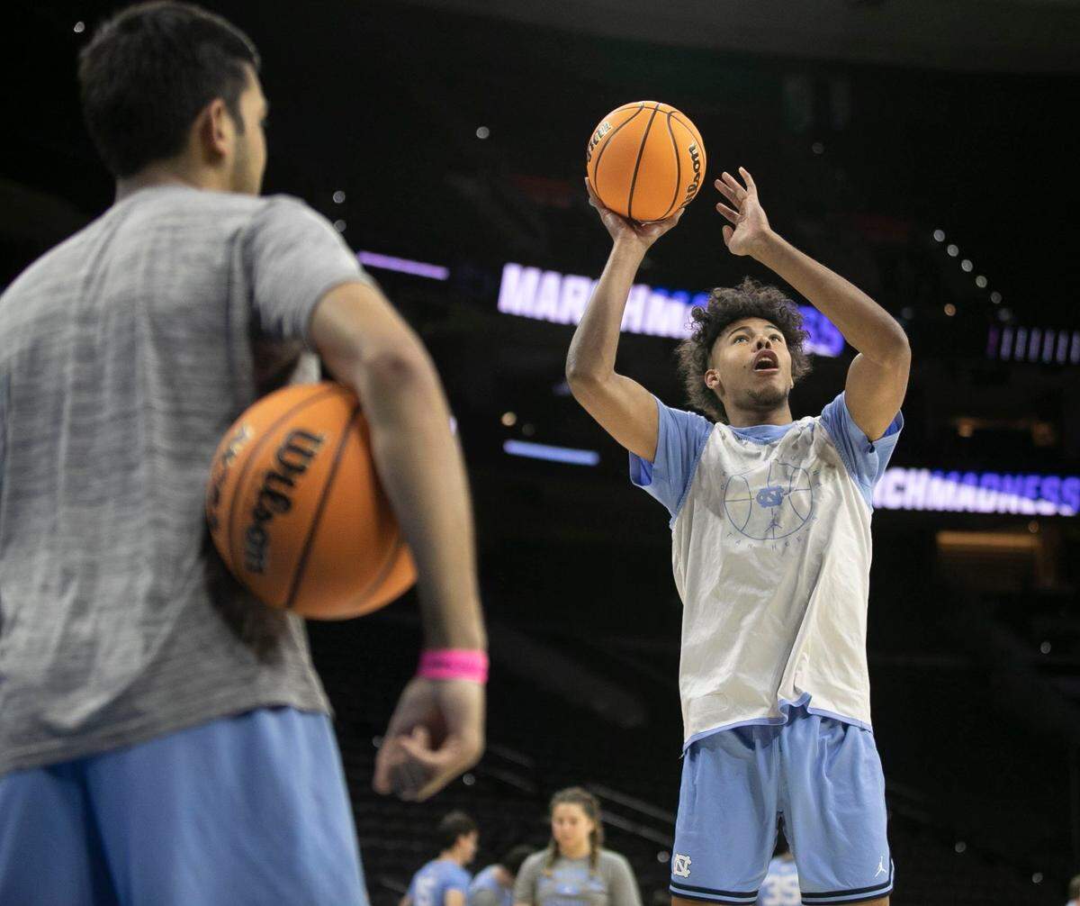 North Carolinas Puff Johnson (14) works on his shooting form during the Tar Heels open practice on Thursday, March 24, 2022 at Wells Fargo Center in Philadelphia, Pa.