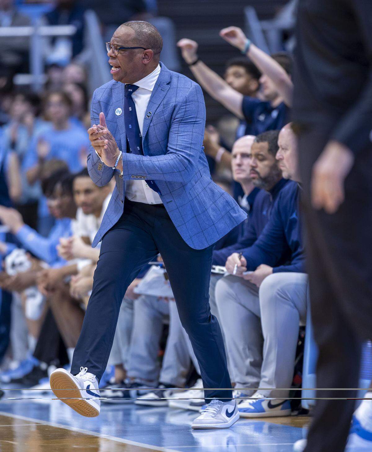 North Carolina coach Hubert Davis applauds his team on defense in the first half against USC Upstate on Saturday, December 13, 2025 at the Smith Center in Chapel Hill, N.C.