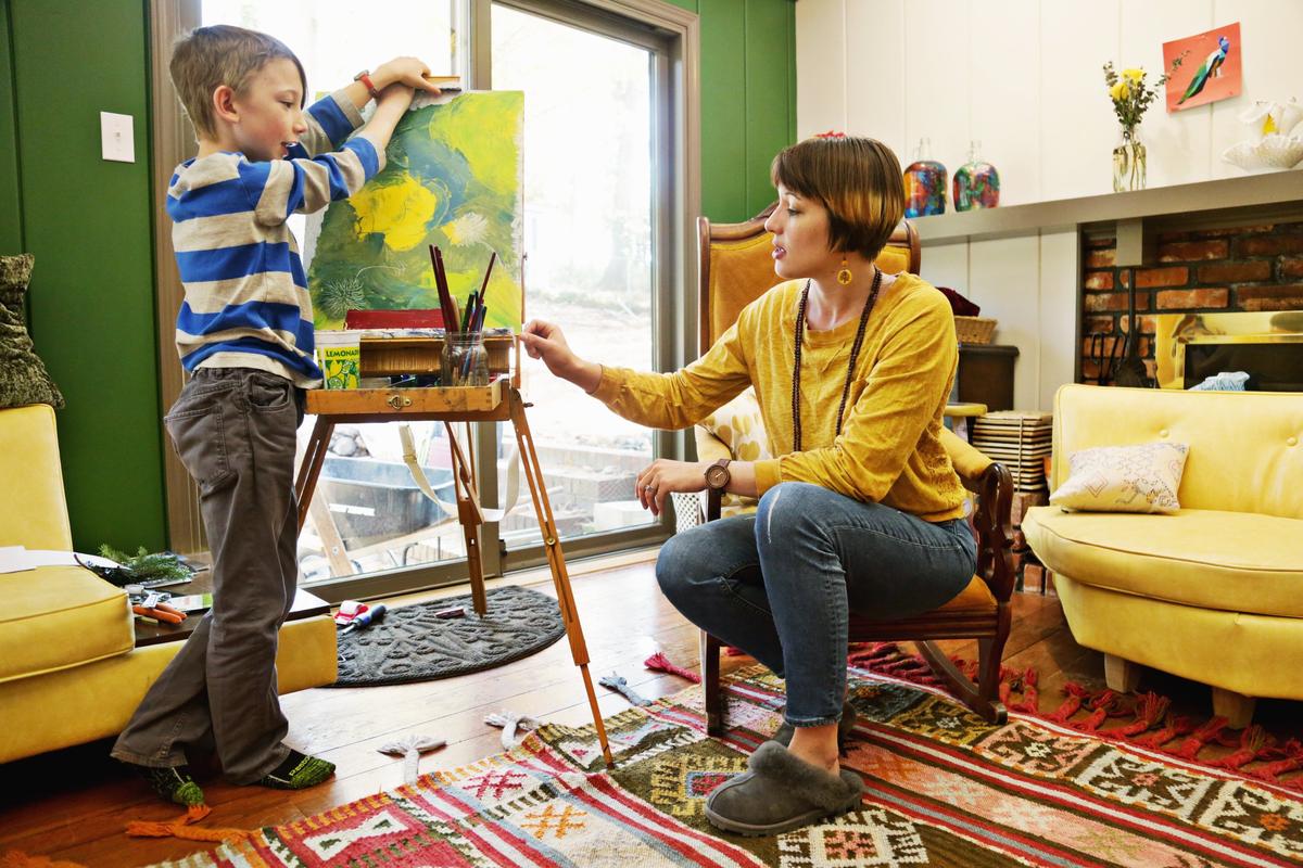 Christy Batts, right, talks with her son, Roald, 8, about a painting he is working on at the family’s Raleigh home on Nov. 28, 2018. Batts, who homeschools Roald, meets weekly with Homeschool Explorers, a secular homeschool cooperative in Wake County.