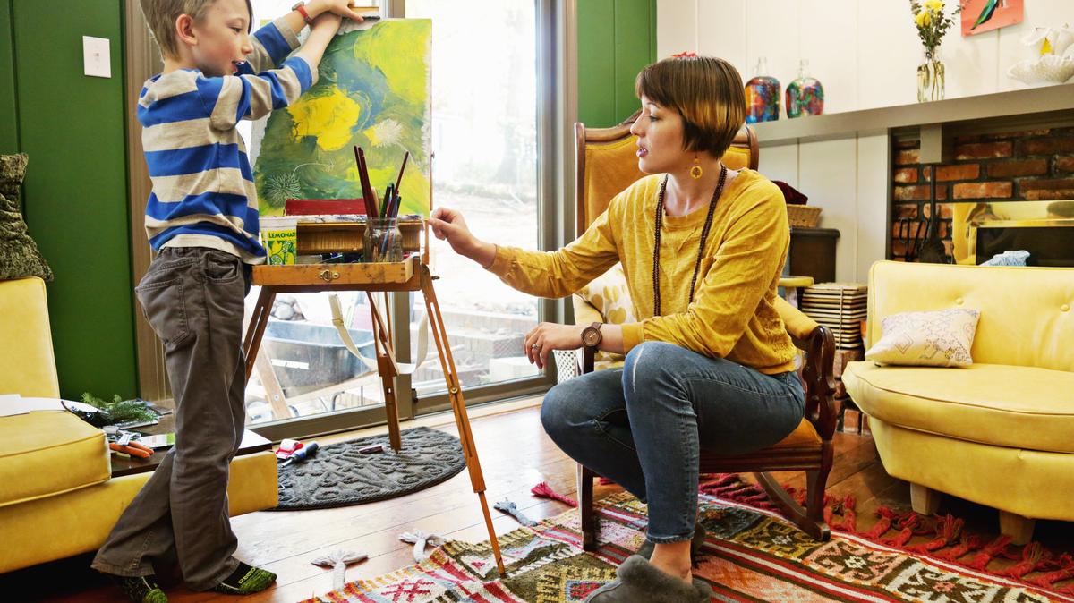 Christy Batts, right, talks with her son, Roald, 8, about a painting he is working on at the family’s Raleigh home on Nov. 28, 2018. Batts, who homeschools Roald, meets weekly with Homeschool Explorers, a secular homeschool cooperative in Wake County.