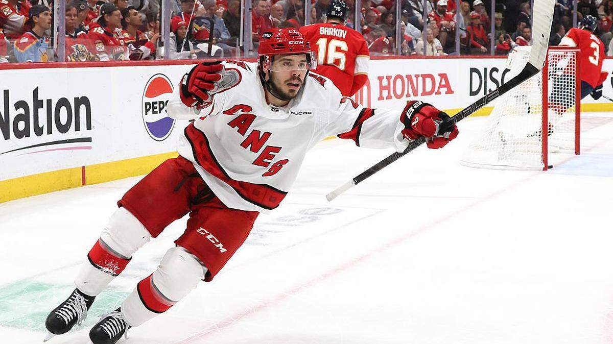 Logan Stankoven of the Carolina Hurricanes celebrates after scoring a goal against Florida during the second period in Game 4 of the Eastern Conference Final of the 2025 Stanley Cup Playoffs at Amerant Bank Arena on May 26, 2025 in Sunrise, Florida. 