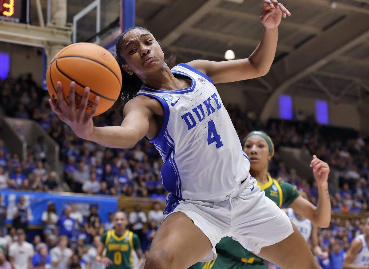Duke’s Riley Nelson attempts to save the ball from going out of bounds during the second half of the Blue Devils’ 69-46 second-round NCAA Tournament win over Baylor on Sunday, March 22, 2026, at Cameron Indoor Stadium in Durham, N.C.
