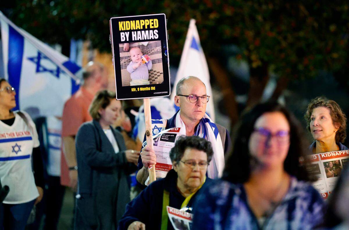 Over a hundred people marched in downtown Raleigh, N.C., on Tuesday, Nov. 7, 2023, calling for the release of hostages taken by Hamas when they attacked Israel in October.