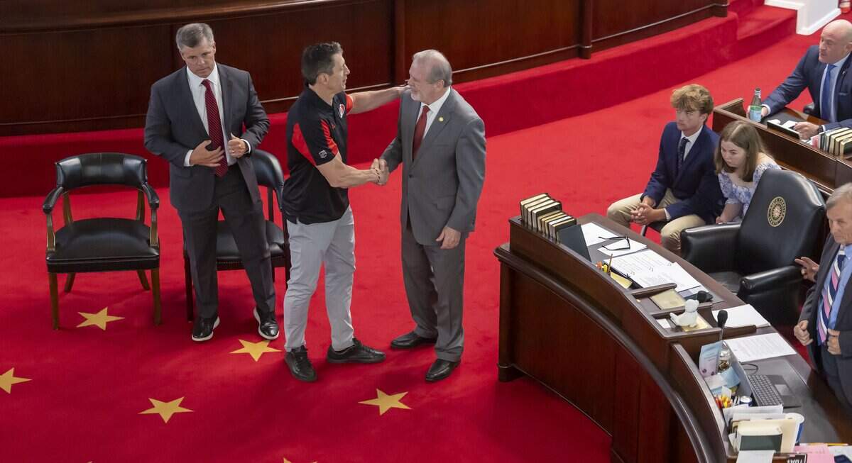 Senate President Pro Tempore Phil Berger shakes hands with Carolina Hurricanes coach Rod Brind’Amour during a visit to the General Assembly, where the team was honored for their Stanley Cup Championship on Tuesday, June 23, 2026 in Raleigh, NC.