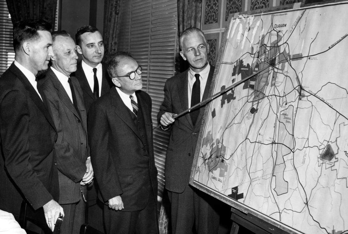 George Watts Hill (right) leads an early planning meeting about RTP in 1958.