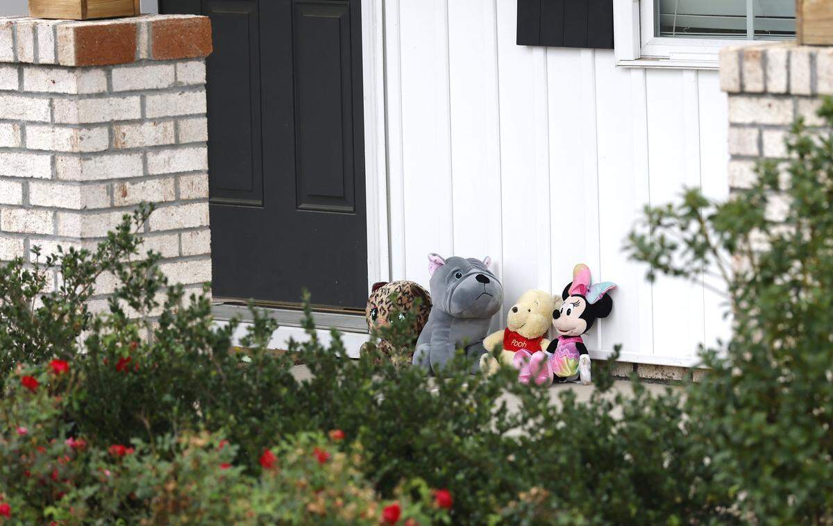 Stuffed animals sit outside the home of Wellington Dickens III in Zebulon, N.C., on Wednesday, Oct. 29, 2025. Dickens faces four charges of murder in the deaths of 6-year-old Leah Dickens, 9-year-old Zoe Dickens, 10-year-old Wellington Dickens IV and 18-year-old Sean Brasfield, his stepson.