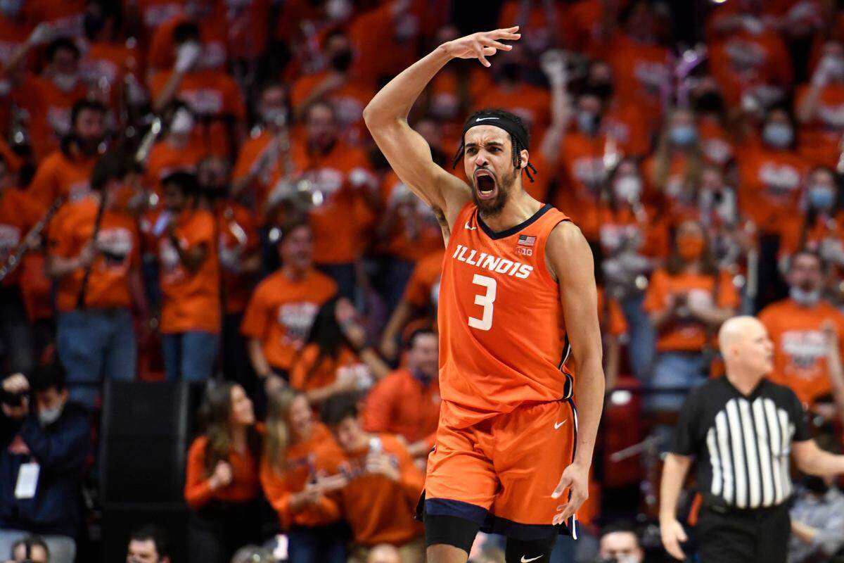 Illinois’ Jacob Grandison pumps up the crowd during the second half of an NCAA college basketball game against Ohio State Thursday, Feb. 24, 2022.