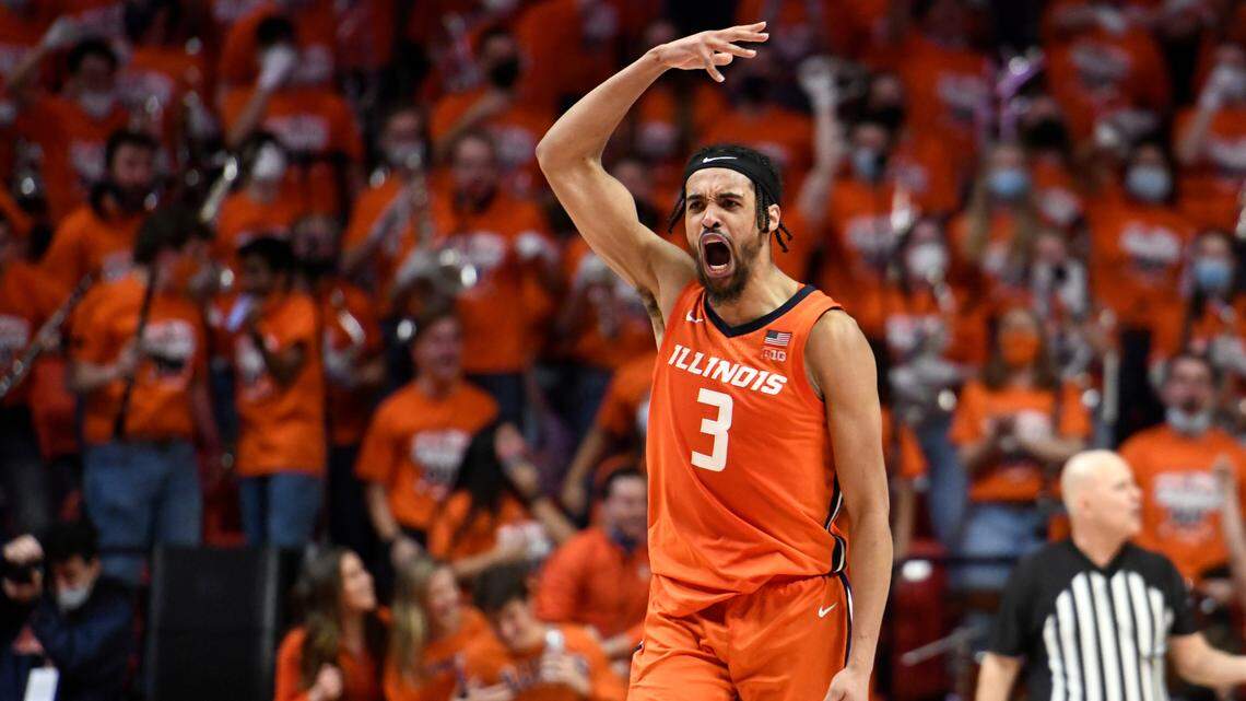 Illinois’ Jacob Grandison pumps up the crowd during the second half of an NCAA college basketball game against Ohio State Thursday, Feb. 24, 2022.