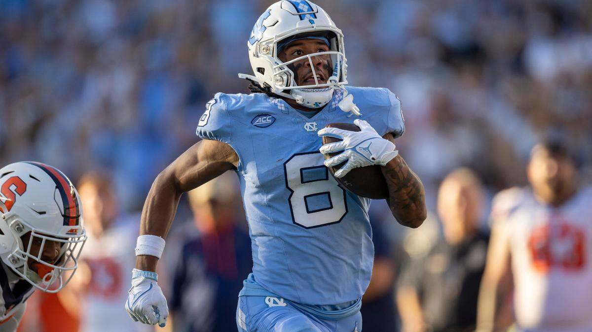 North Carolina’s Kobe Paysour (8) scores on a 76-yard pass play from quarterback Drake Maye to give the Tar Heels’ a 37-7 lead in the third quarter on Saturday, October 7, 2023 at Kenan Stadium in Chapel Hill, N.C.