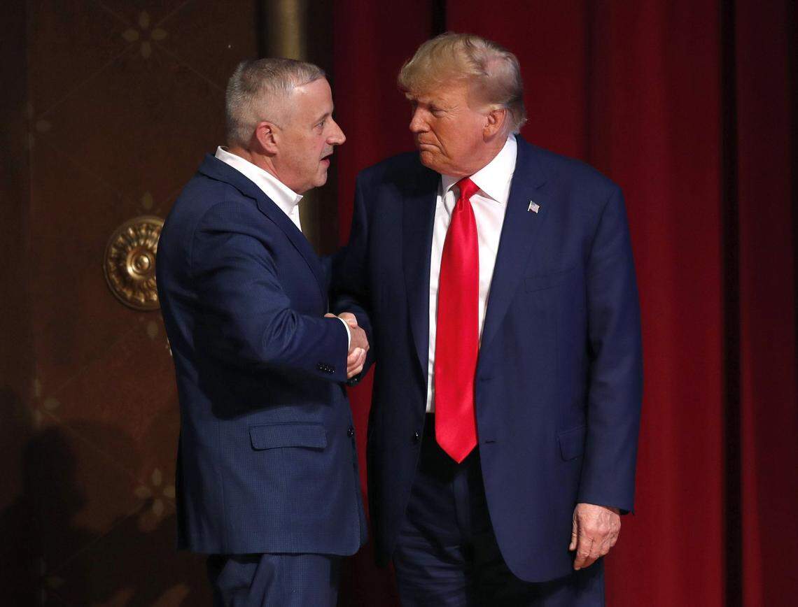 North Carolina Republican Party chairman Michael Whatley greets former President Donald Trump as he arrives for his address to the North Carolina Republican Party Convention at the Koury Convention Center on Saturday, June 10, 2023 in Greensboro, N.C.