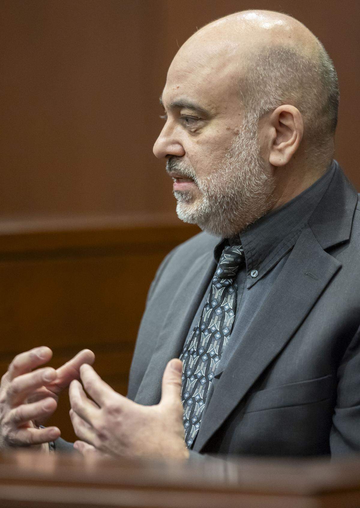 Dr. Maher Noureddine, a forensic DNA consultant, testifies about the DNA make-up of Austin Thompson, during his sentencing on Wednesday in Raleigh. Thompson is being sentenced after pleading guilty to murder in the 2022 Hedingham neighborhood mass shooting.