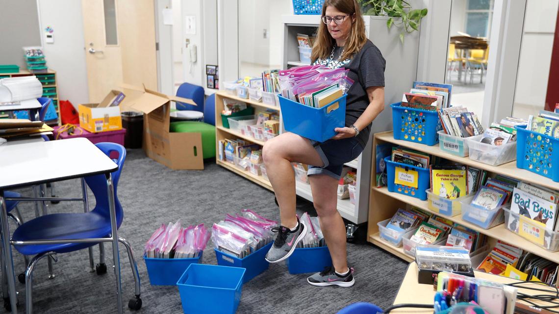 Fourth grade teacher Joanne Londe finishes unpacking while getting her classroom ready at North Ridge Elementary School in this 2019 file photo. Londe is among the nationally board certified teachers in the Wake County school system.