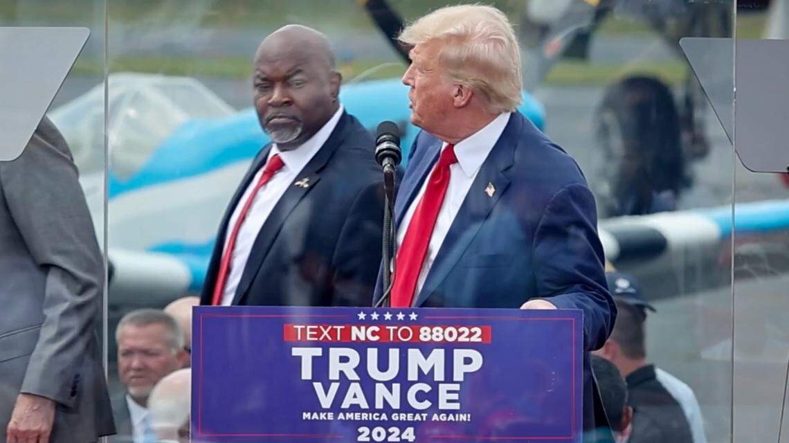 Former President Donald Trump acknowledges North Carolina Lt. Governor and Republicancandidate for governor at a campaign rally in Asheboro in August.