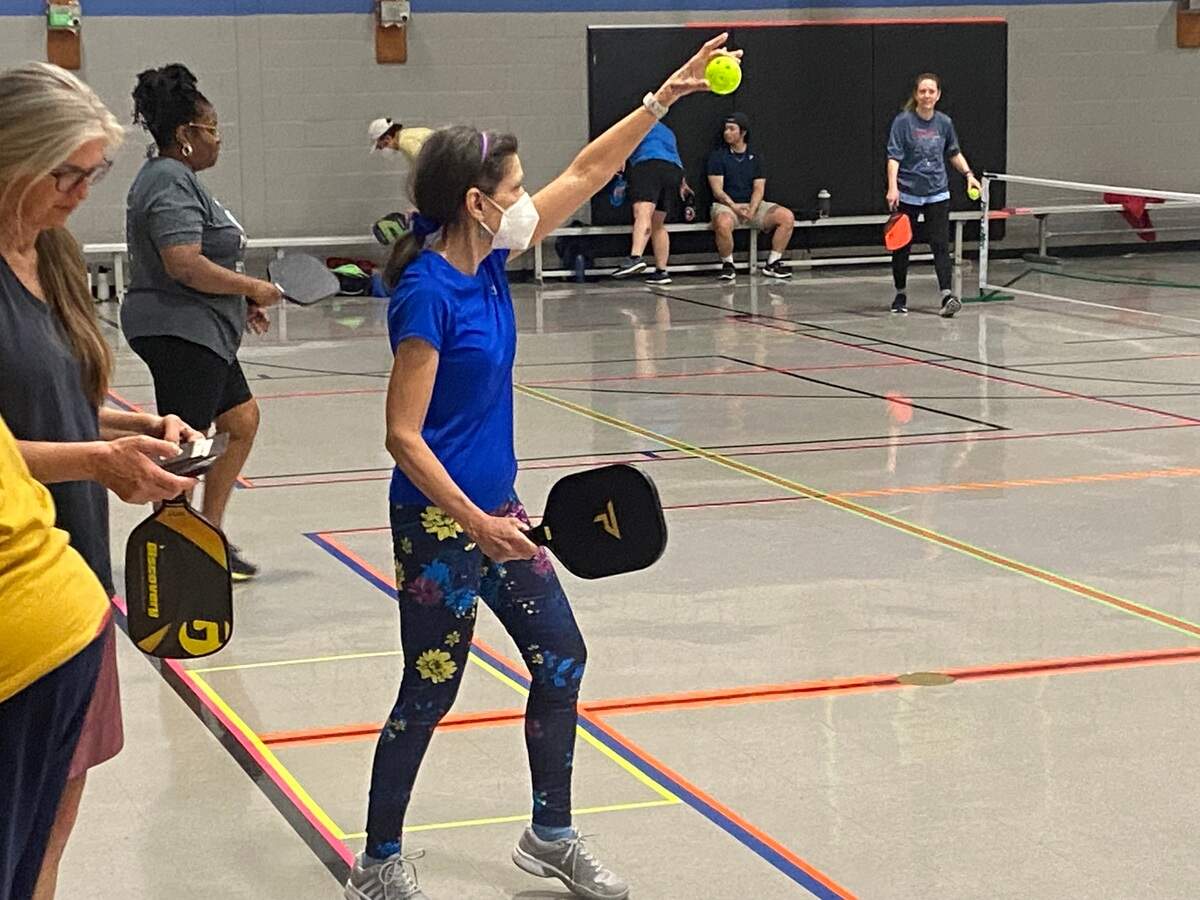 Mary Jo Panettieri serves up a pickleball at Tarboro Road Community Center in Raleigh.
