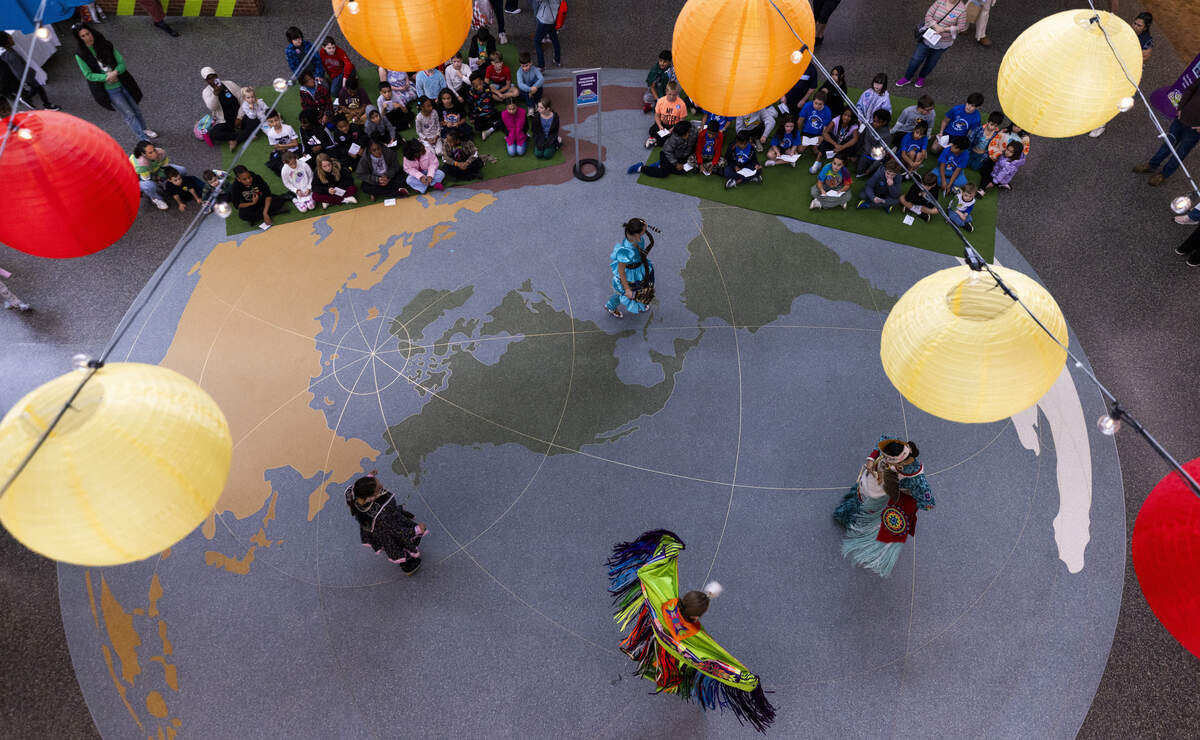 Indigenous dancers perform during a Native American Heritage Month celebration at Marbles Kids Museum in Raleigh on Tuesday, Nov. 25, 2025. Wake County Public Schools fourth-graders took part in a field trip to the museum that included exhibits, interactive stations and performances highlighting Native American culture in North Carolina.