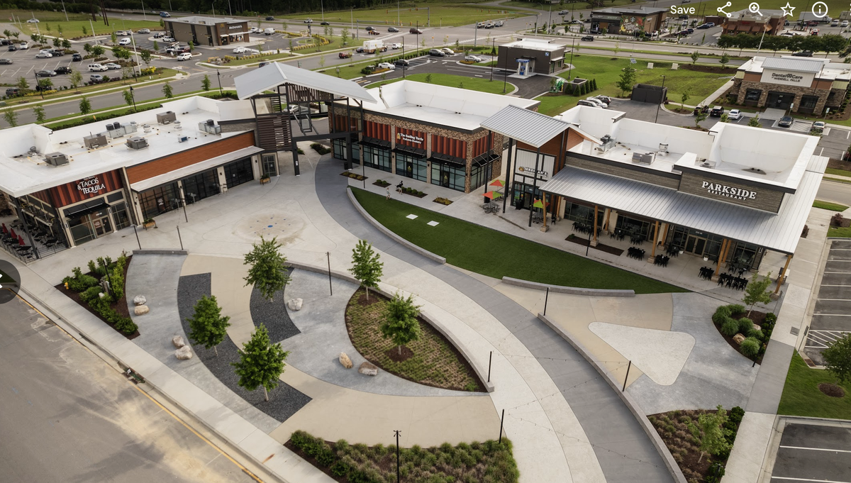 An aerial photo of Treelight Square, Wendell Falls’ retail and dining destination.