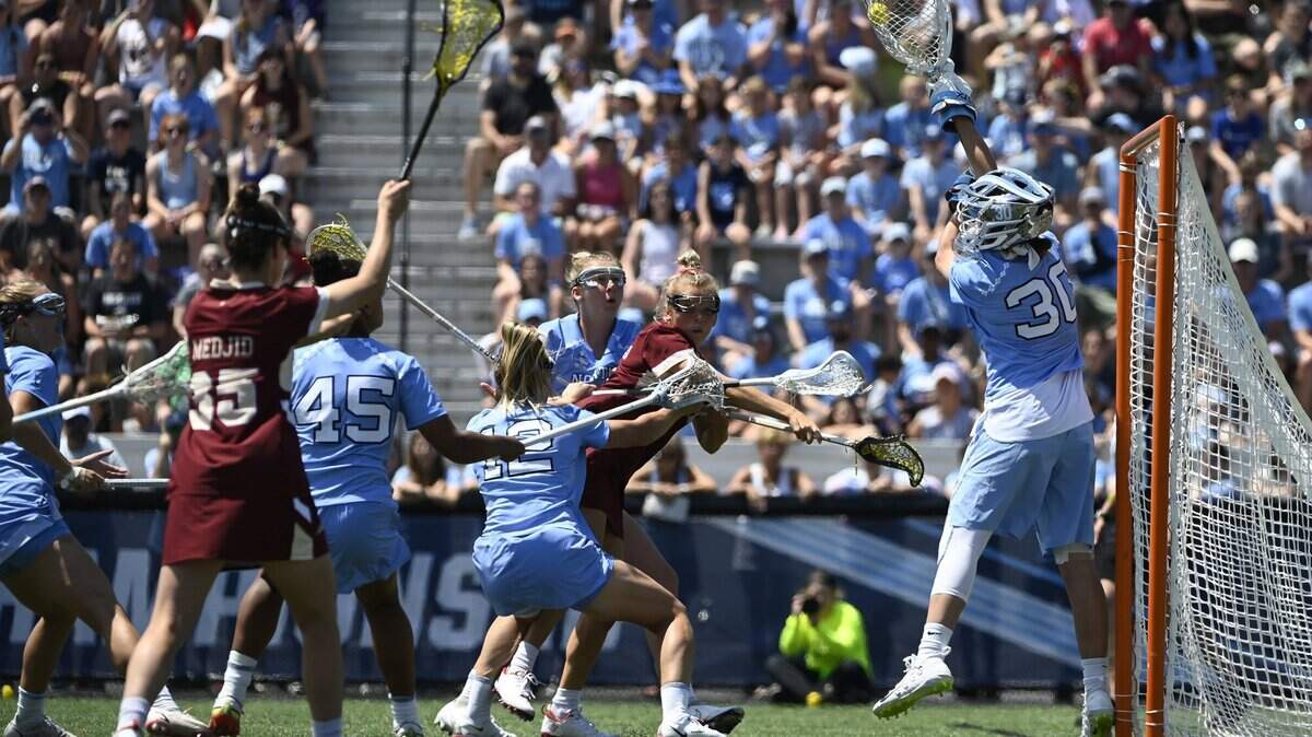 Boston College attack Caitlynn Mossman, second from right, scores the first goal against North Carolina during the NCAA college Division 1 women’s lacrosse championship in Baltimore, Sunday, May 29, 2022. (Vincent Alban/The Baltimore Sun via AP)