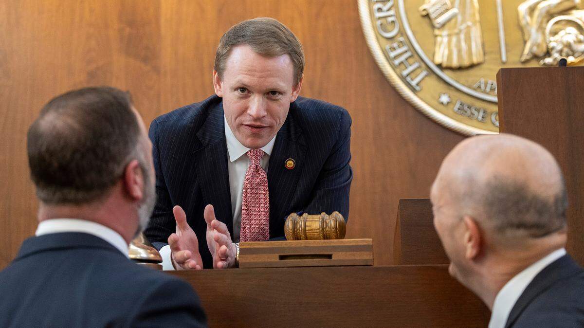 Lawmakers congratulate newly elected House Speaker Destin Hall after the North Carolina General Assembly convened for its 2025 legislative session on Wednesday, Jan. 8, 2025, at the Legislative Building.