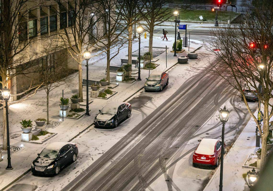 A light blanket of snow covers Fayetteville Street on Friday, January, 10, 2025 in Raleigh, N.C.