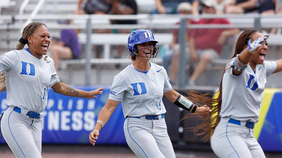 Duke’s Jala Wright, Ana Gold and D’Auna Jennings celebrate following the Blue Devils’ 4-3 victory over Clemson in the ACC Tournament semifinals on Friday, May 10, 2024, in Durham, N.C.
