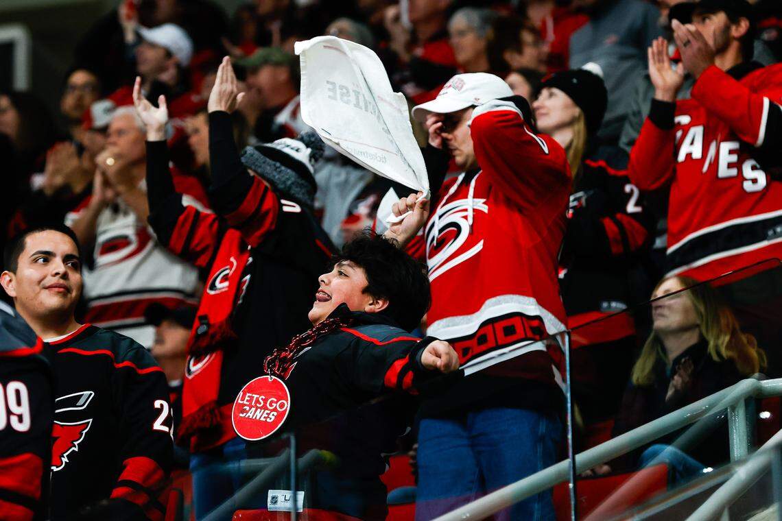 A Carolina Hurricanes fan celebrates during the first period of the game against the Vegas Golden Knights at the Lenovo Center on October 28, 2025 in Raleigh, North Carolina. The Hurricanes rebounded with a win over the New York Islanders on Thursday.