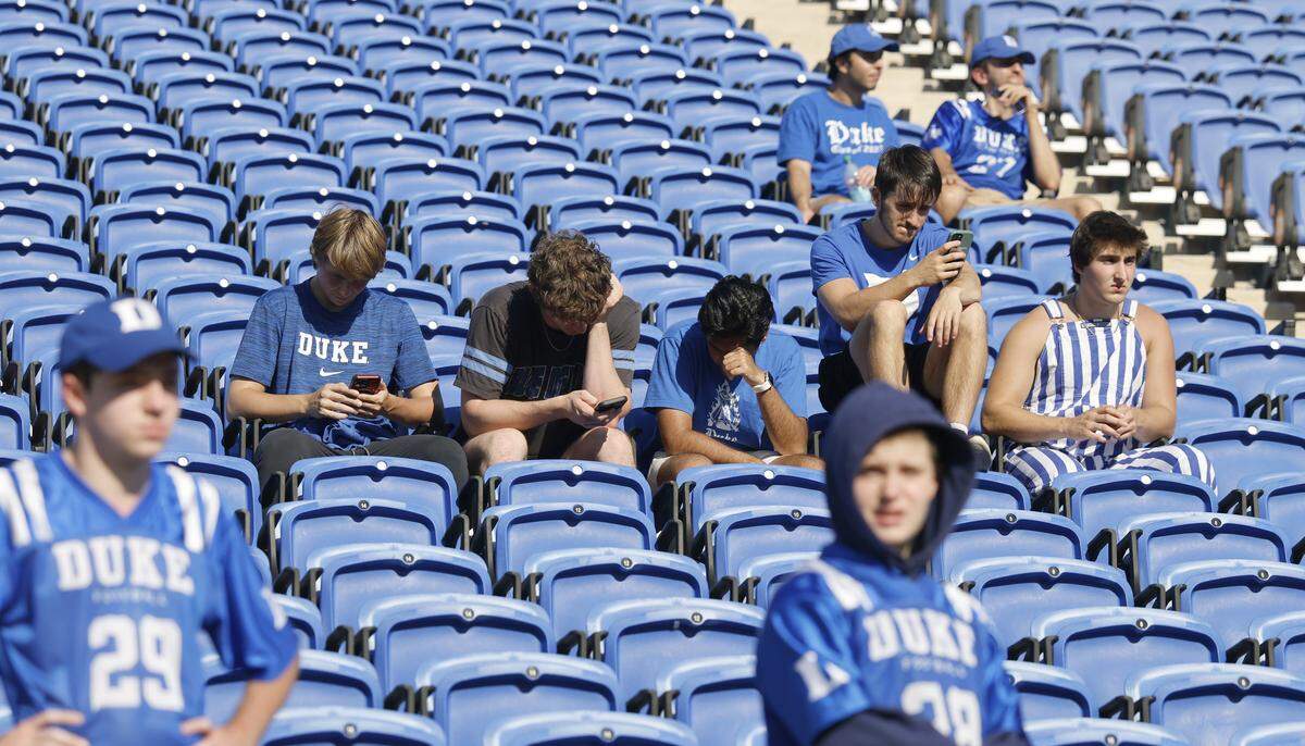 Duke fans sit in the stands late in the second half of Georgia Tech’s 27-18 victory over Duke at Wallace Wade Stadium in Durham, N.C., Saturday, Oct. 18, 2025.