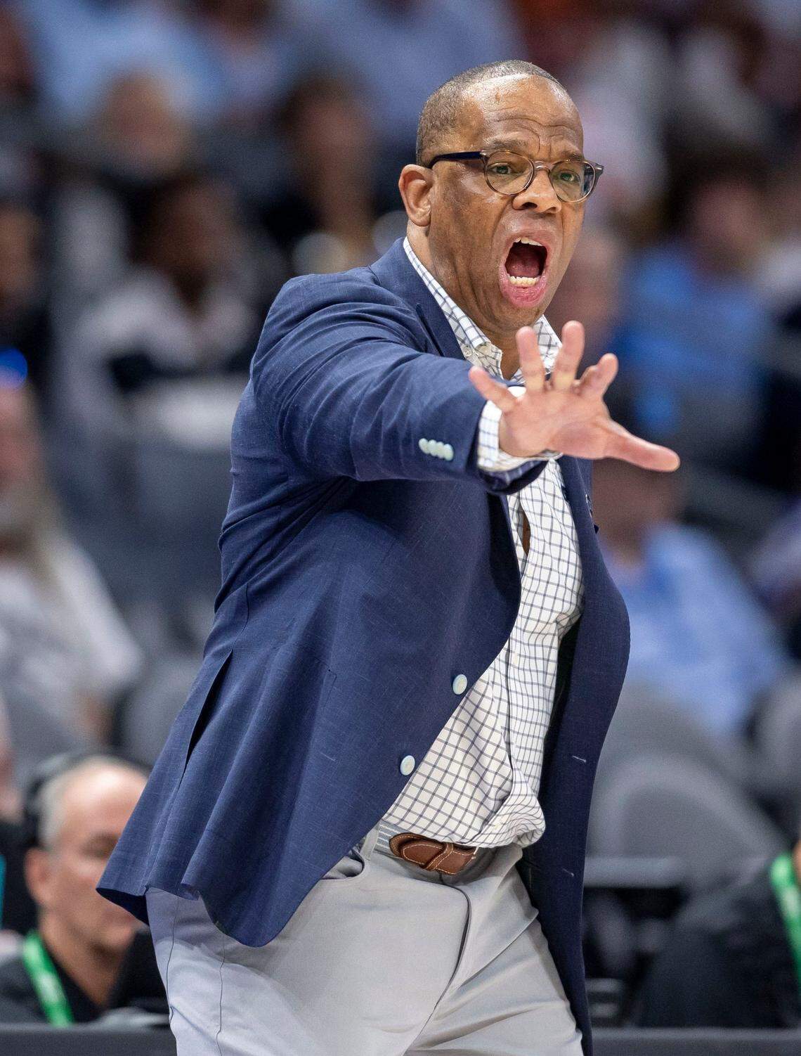 North Carolina coach Hubert Davis directs his team on defense in the first half against Notre Dame on Wednesday, March 12, 2025 during the second round of the ACC Tournament at Spectrum Center in Charlotte, N.C.