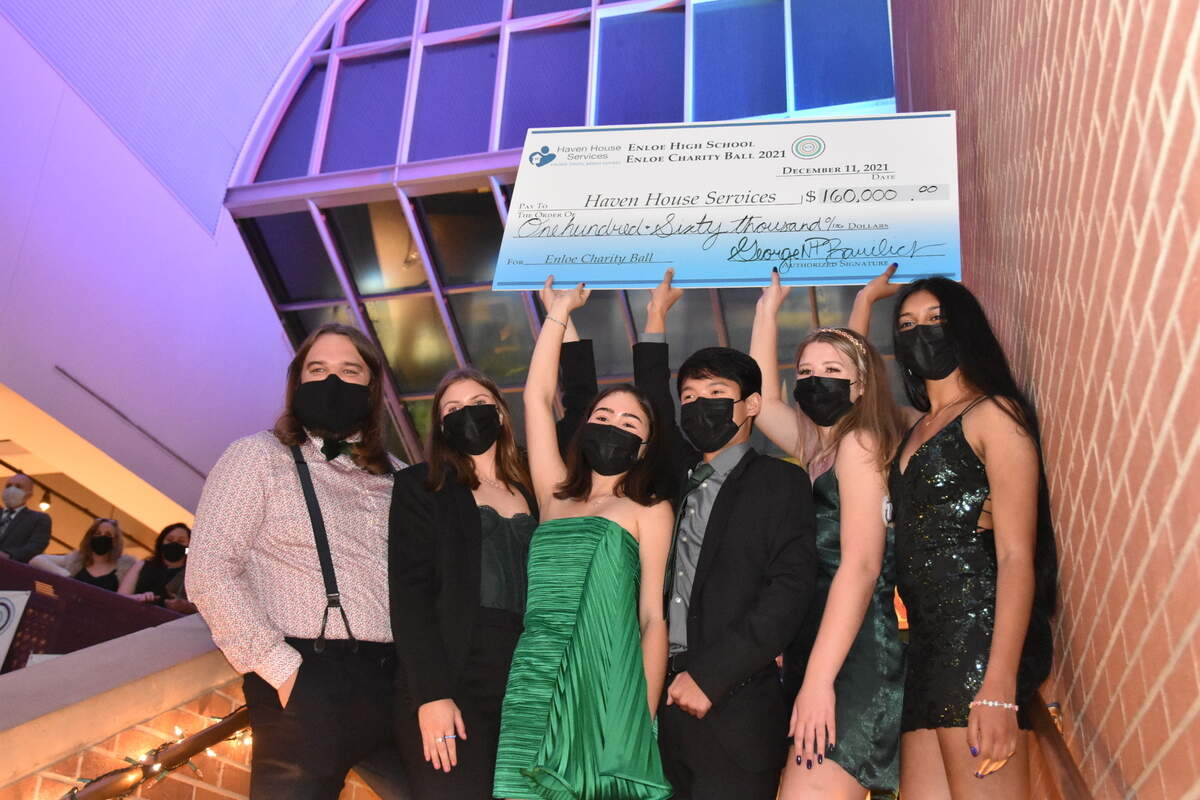 Leaders of the 2021 Enloe Charity Ball hold up the $160,000 check given to Haven House Services as part of this year’s fundraising effort. The check was presented at the ball held Dec. 11, 2021 at Marbles Kids Museum in Raleigh.