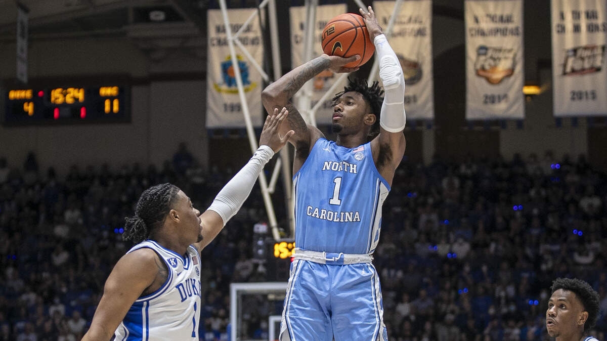 North Carolina’s Leaky Black (1) puts up a shot over Duke’s Trevor Keels (1) on March 5, 2020 at Cameron Indoor Stadium in Durham, N.C. The two teams face off again Saturday, April 2, 2022 in the Final Four.