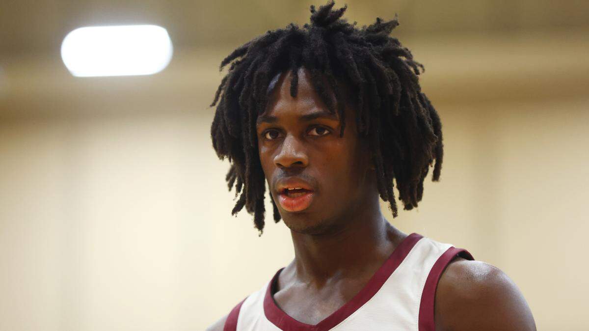 Cardinal Hayes Cardinals guard Ian Jackson (11) against the Duncanville High School Panthers during the HoopHall West basketball tournament at Chaparral High School.