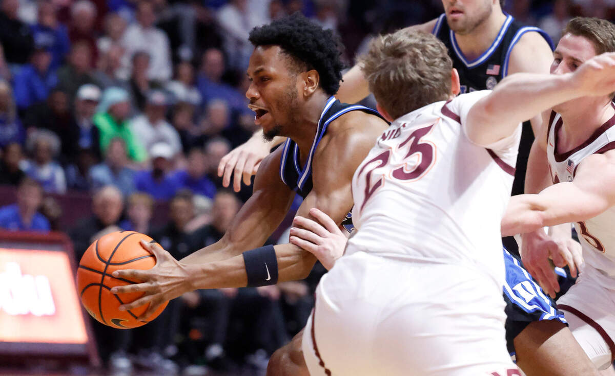Duke’s Jeremy Roach (3) drives past Virginia Tech’s Tyler Nickel (23) during the first half of Duke’s game against Virginia Tech at Cassell Coliseum in Blacksburg, Va., Monday, Jan. 29, 2024.