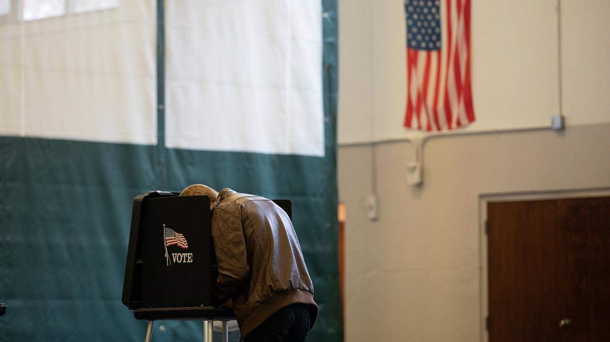 A person votes at the Herbert C. Young Community Center in Cary, N.C. on Tuesday, March 5, 2024.