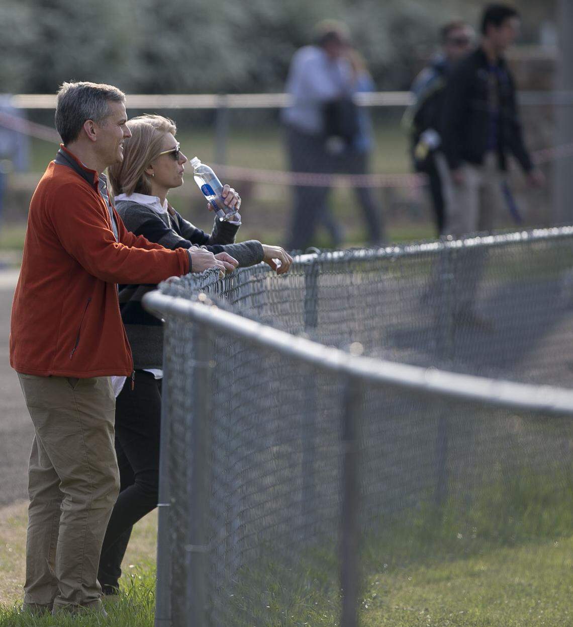 North Carolina Attorney General Josh Stein and his wife Anna Stein watch a lacrosse match at Broughton High School on Wednesday, April 11, 2018 in Raleigh, N.C. Their son Adam Stein is a member of the Broughton lacrosse team. 
