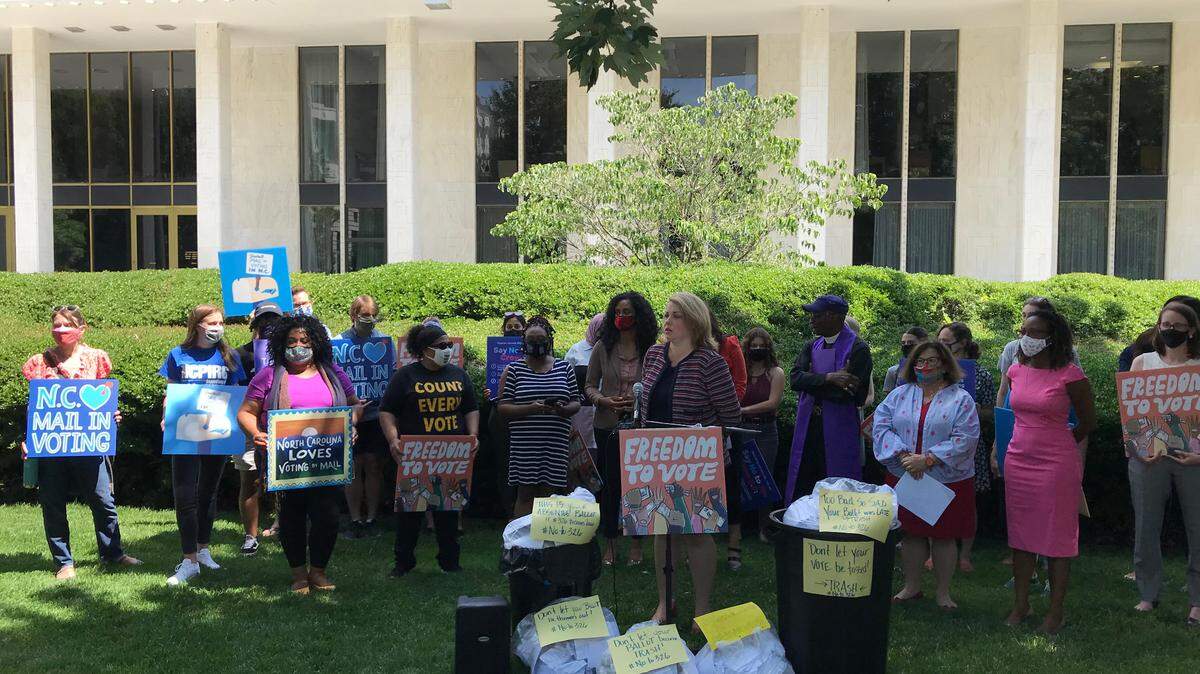 Activists from prominent civil rights groups and liberal organizations held a news conference Monday, June 14, 2021, outside the General Assembly in Raleigh, North Carolina. They denounced a group of bills advancing through the state Senate that would make changes to absentee voting and limit sources of funding for election administration.