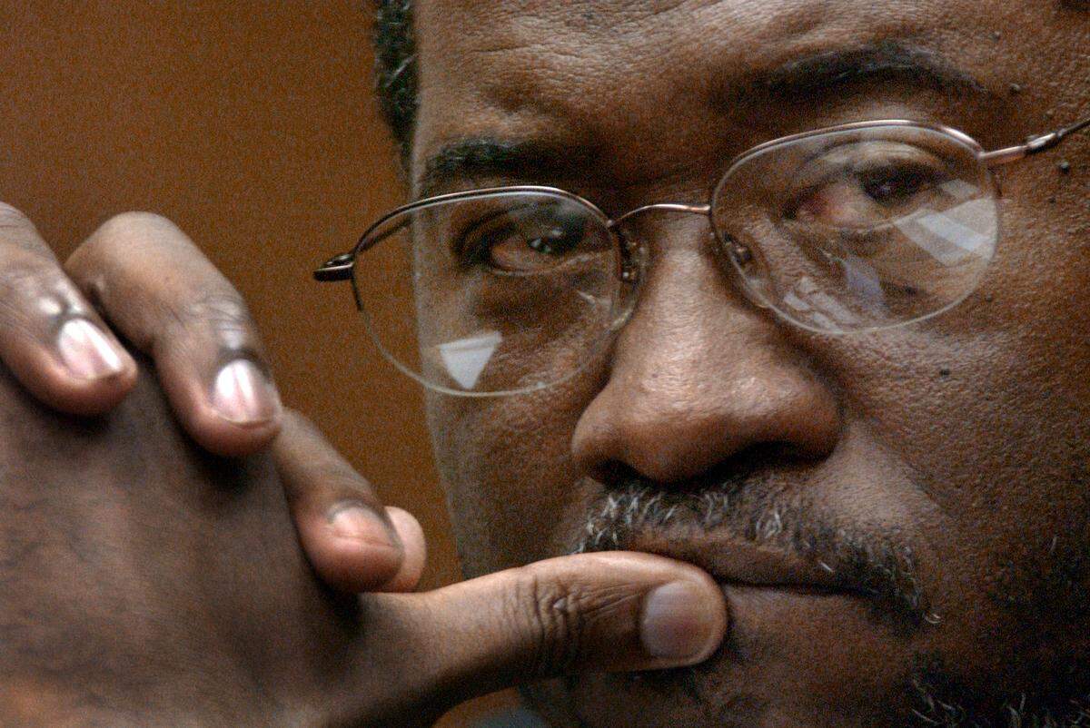HUDSON1.NE.071103.CEL--DURHAM,NC--07/11/03--Durham Superior Court Judge Orlando Hudson listens carefully to a witnes during testimony in the Michael Peterson murder trial.STAFF PHOTO:CHUCK LIDDY