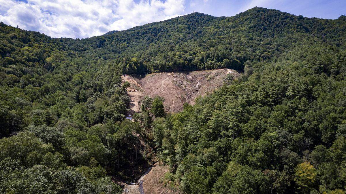 An aerial view in late August 2025 shows a rock quarry site in the Pisgah National Forest near Interstate 40 in the Pigeon River Gorge near the North Carolina-Tennessee border.