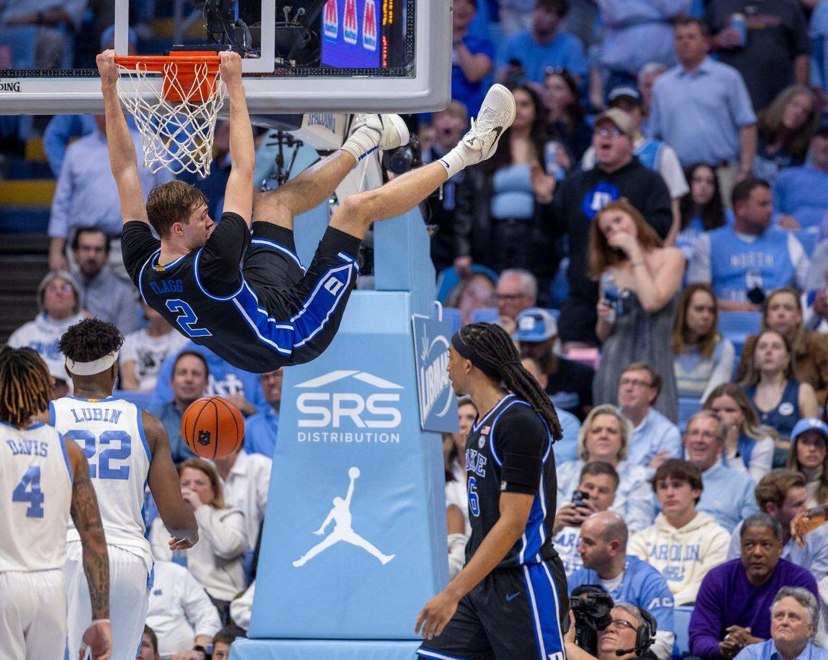 Duke’s Cooper Flagg (2) dunks to secure the Blue Devils’ 82-67 lead against North Carolina on Saturday, March 8, 2025 at the Smith Center in Chapel Hill, N.C.