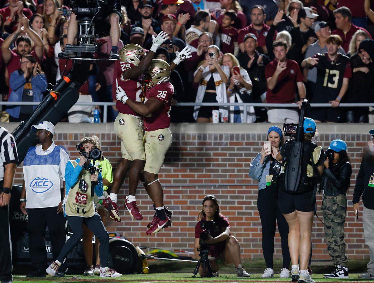 Florida State celebrates on the sidelines following a touchdown late in the second half of the Seminoles’ 38-20 win over Duke on Saturday, Oct. 21, 2023, in Tallahassee, Fla.