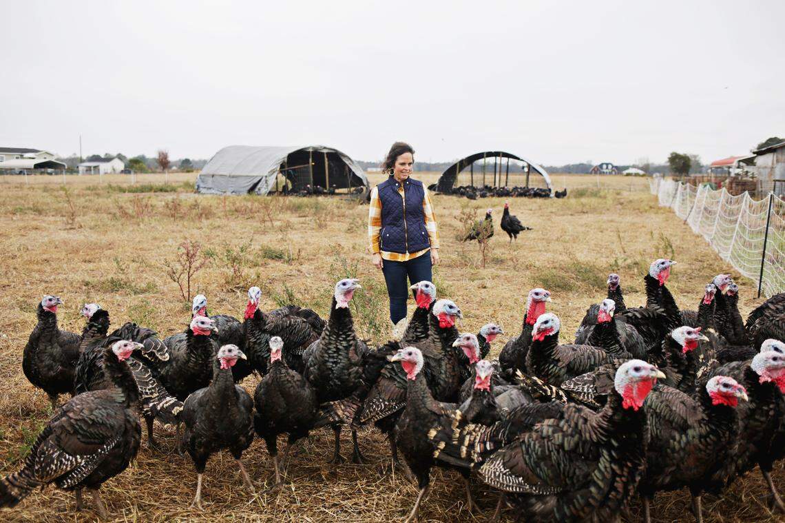 Farmer Genell Pridgen with the season’s turkeys at Rainbow Meadows Farm in Snow Hill, NC, on Nov. 14, 2018. ItÕs costly to raise livestock the way Rainbow Meadows does it; itÕs labor intensive and, taking just a few animals for slaughter at a time, there are no economies of scale.