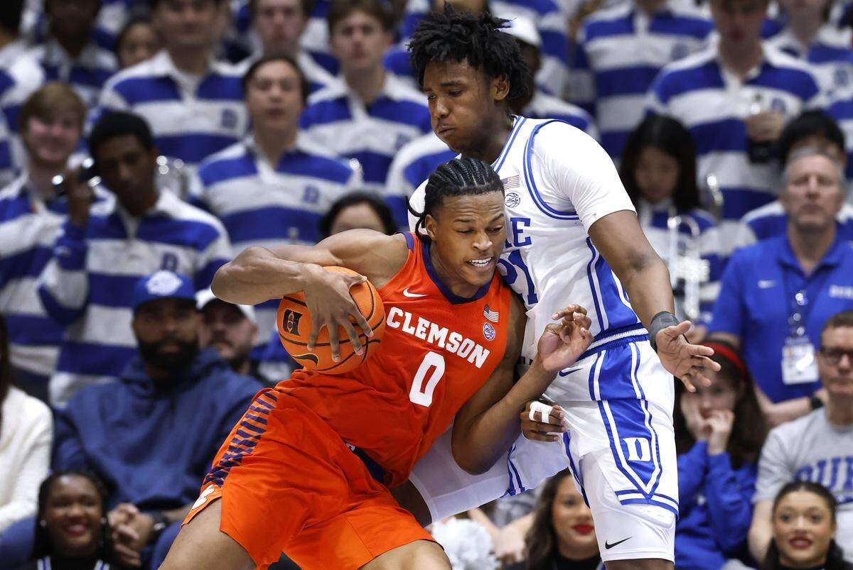 Duke’s Patrick Ngongba II (21) defends Clemson's RJ Godfrey during the second half of Duke’s 67-54 victory over Clemson at Cameron Indoor Stadium in Durham, N.C., Sat., Feb. 14, 2026.