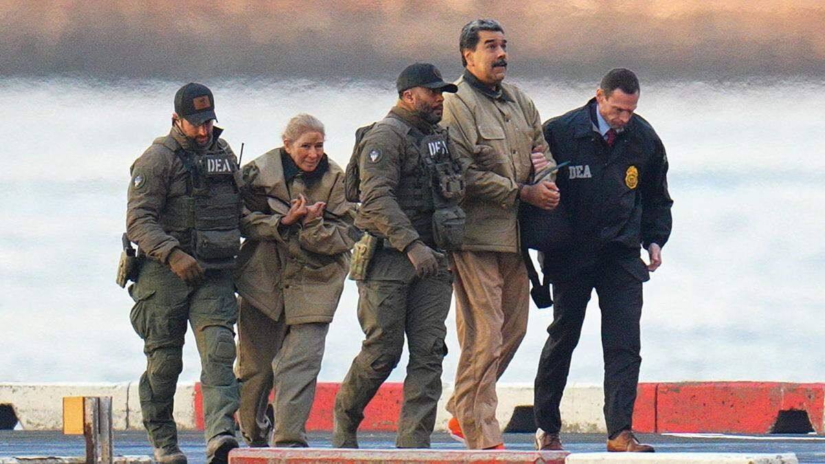 Ousted President Nicolas Maduro of Venezuela, and his wife, Cilia Flores, arrive at the Wall Street Heliport in the New York City borough of Manhattan, to be transported to appear in a New York court. They are to be arraigned as part of a Narco-Terrorism indictment against them by the United States Government.   