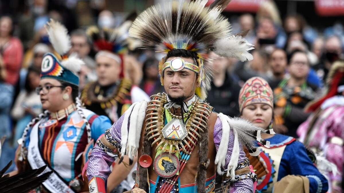 Brandon Locklear of the Halowi-Saponi tribe leads dancers at the first Inter-tribal Pow Wow celebrating the legacy and culture of North Carolina Indigenous communities at Saturday, Oct. 30, 2021 at Raleigh’s Dix Park.