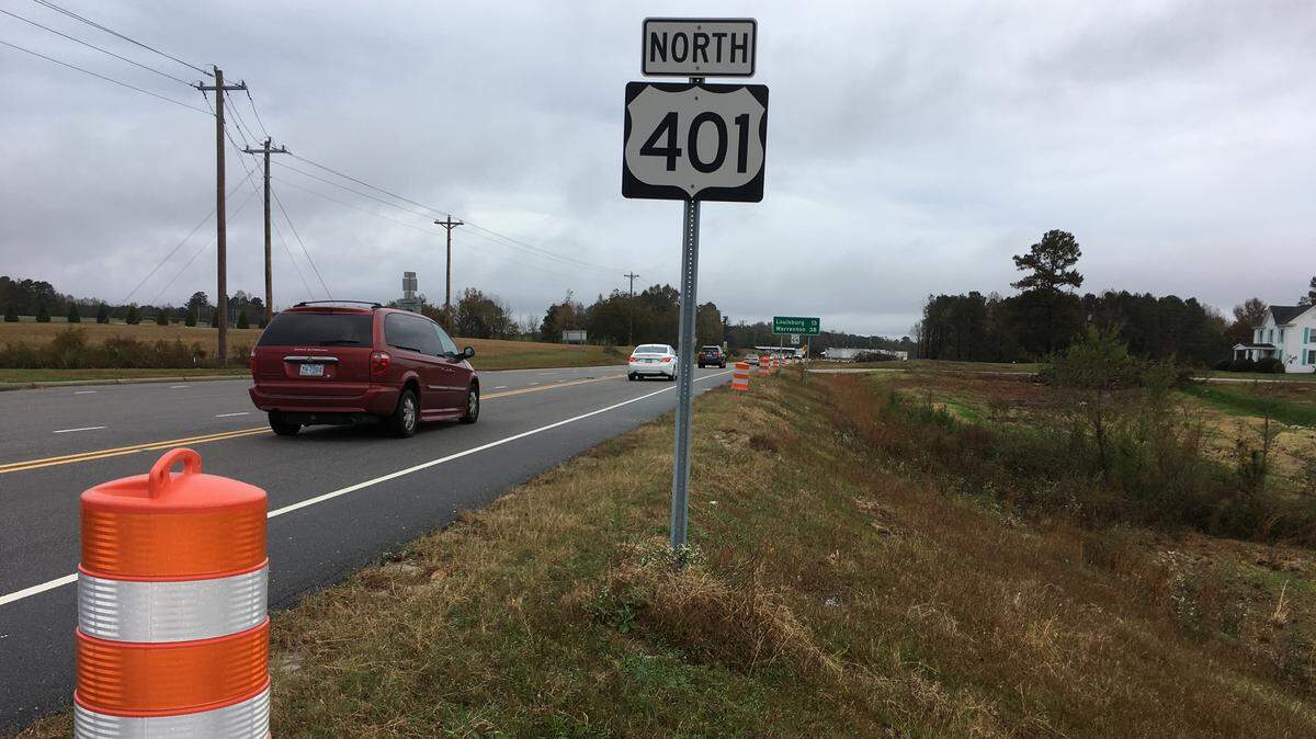 Orange and white barrels and piles of felled trees now line the six-mile stretch of U.S. 401 north of Rolesville that will be widened to four lanes in the coming years.