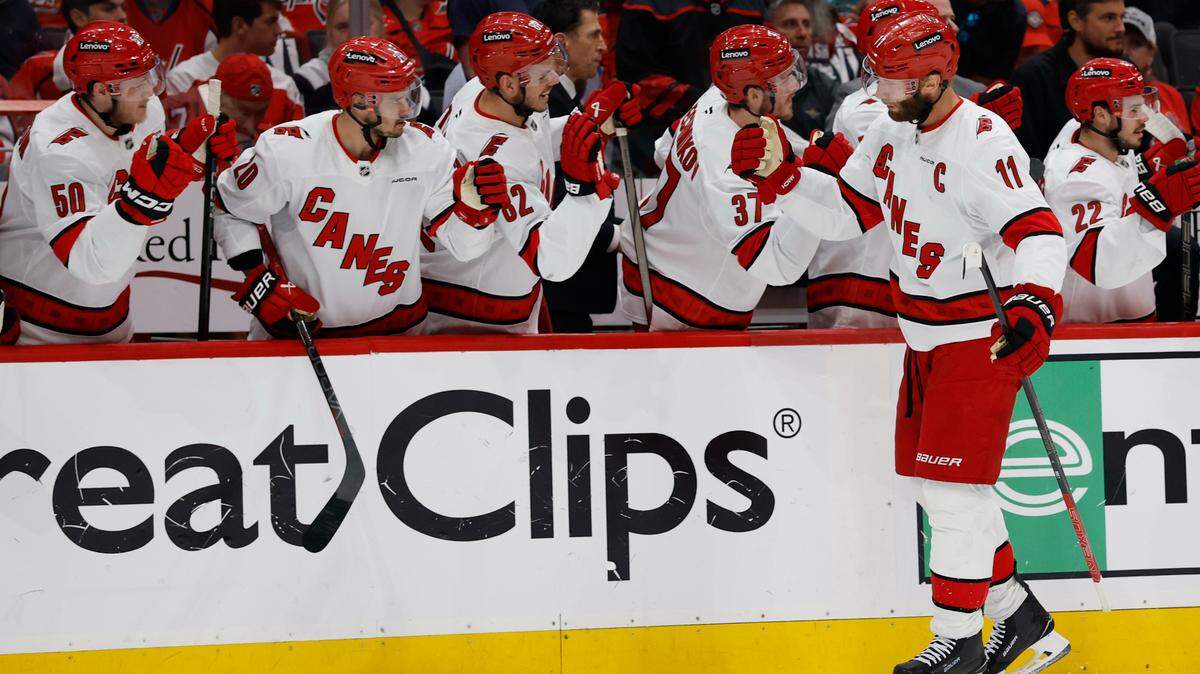 Carolina Hurricanes center Jordan Staal (11) celebrates with teammates after scoring a goal against the Washington Capitals in the first period in game five of the second round of the 2025 Stanley Cup Playoffs at Capital One Arena.