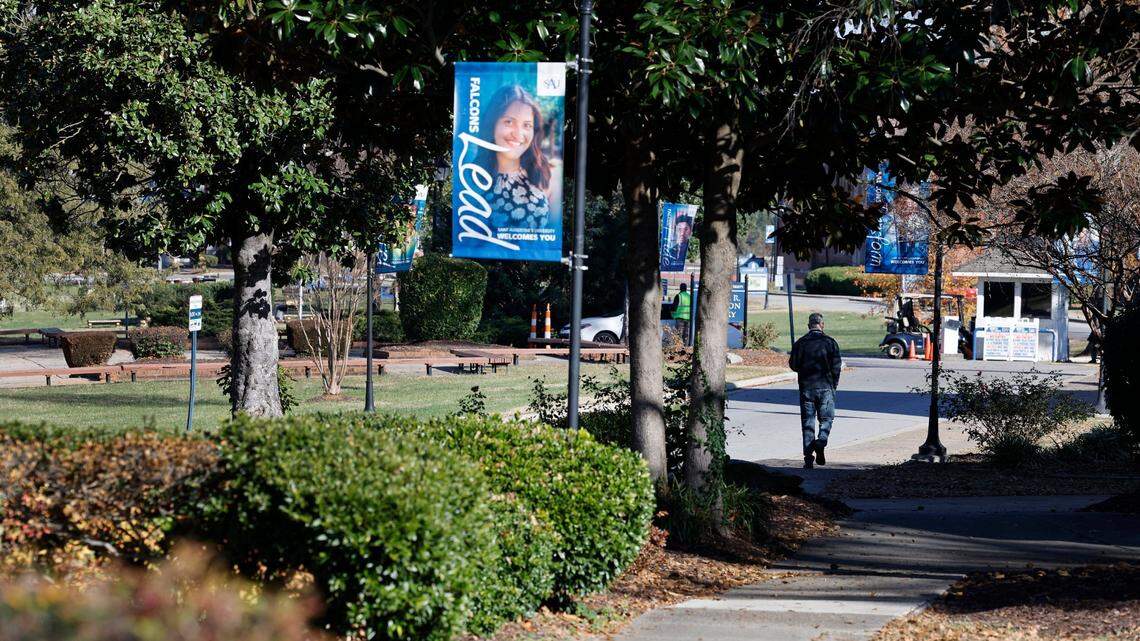 The tree lined street of Prezell R Robinson Library Circle welcomes students, teachers, staff and visitors to St. Augustine’s University in Raleigh, N.C., photographed Tuesday, Dec. 5, 2023.